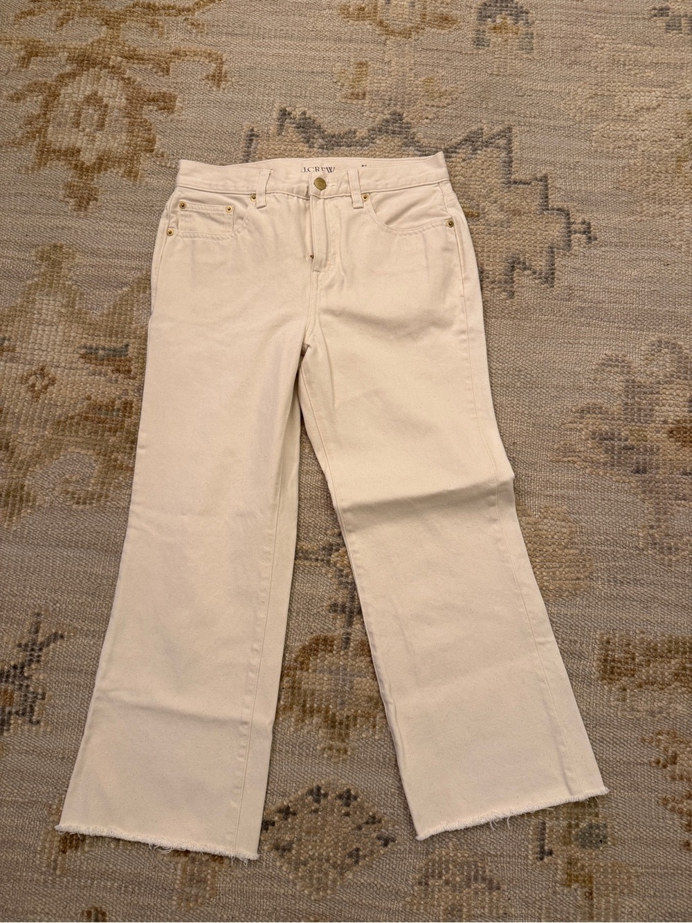 J. Crew ‘84 Kick Out Denim with Raw Hem in Cream. Size 26P.